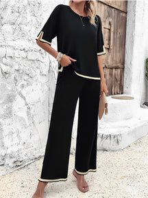 Conjunto em Viscose com Blusa Mullet de Manga Curta e Calça Cintura Alta com Fenda na Barra