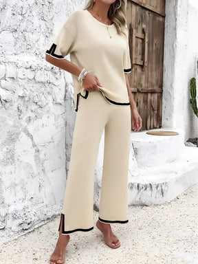 Conjunto em Viscose com Blusa Mullet de Manga Curta e Calça Cintura Alta com Fenda na Barra